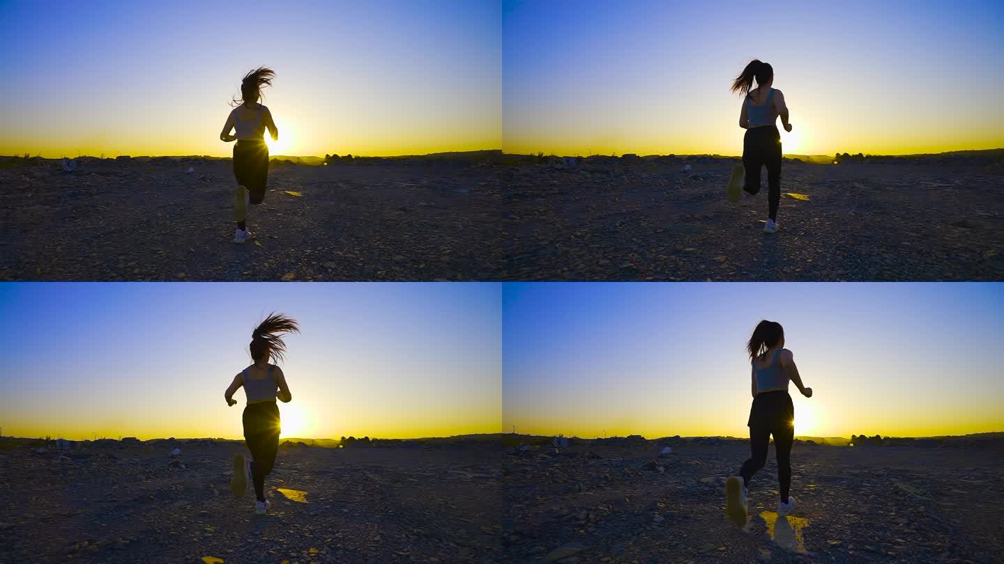 日落跑步的女孩运动健康锻炼奔跑速度有氧脚