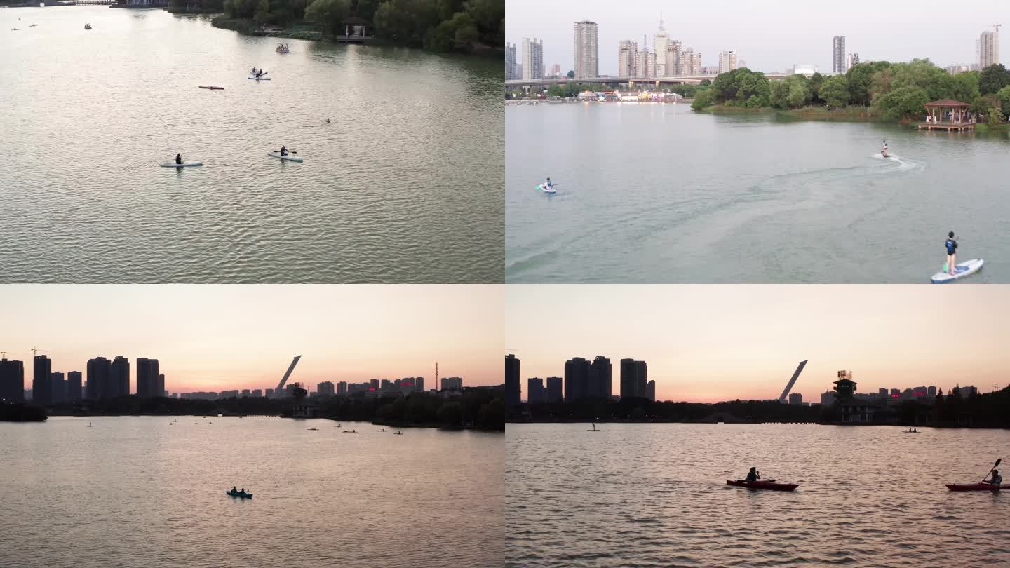 4k夕阳下游客水上划桨航拍视频合集