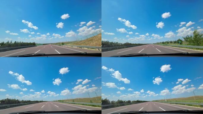 行驶在公路上窗外的蓝天白云