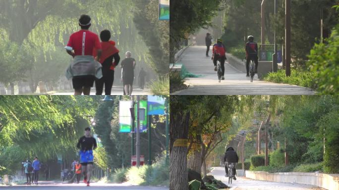 奔跑早晨活力绿色树林公园幸福生活骑行骑车