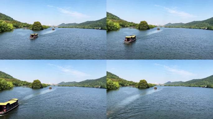 5A级旅游景区湘湖里的游船缓慢驶来