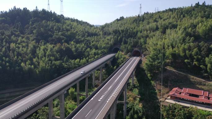 高速公路汽车进出隧道航拍高架桥隧道高速路