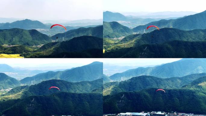 实拍高山滑翔伞在空中飘动