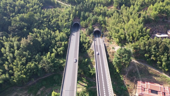 高速公路汽车进出隧道航拍高架桥隧道高速路