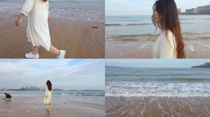 白衣美女沙沙滩散步