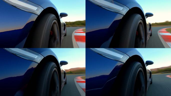 跑车在赛车跑道上行驶，转弯时，前轮旋转的特写镜头