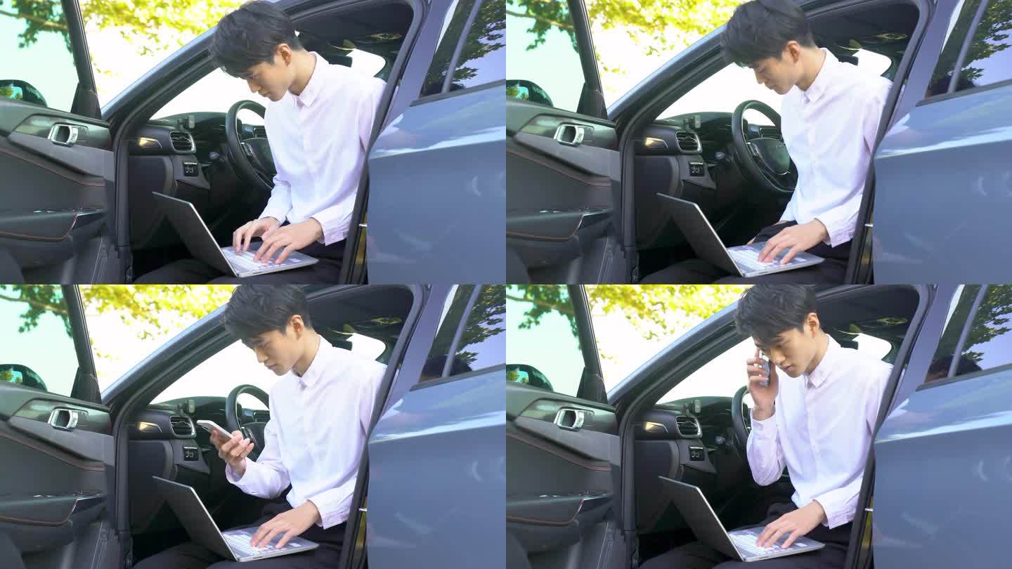 汽车内商务男性使用手机通话