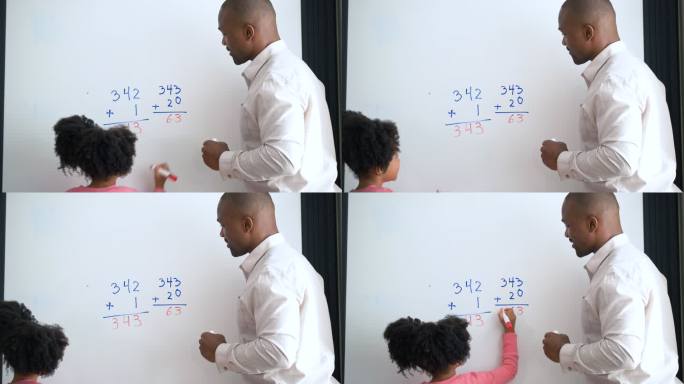 父亲在家教育女儿，在白板上做数学