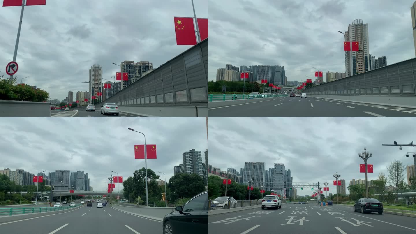 城市穿梭行车第一视角国庆节城市街道旗帜