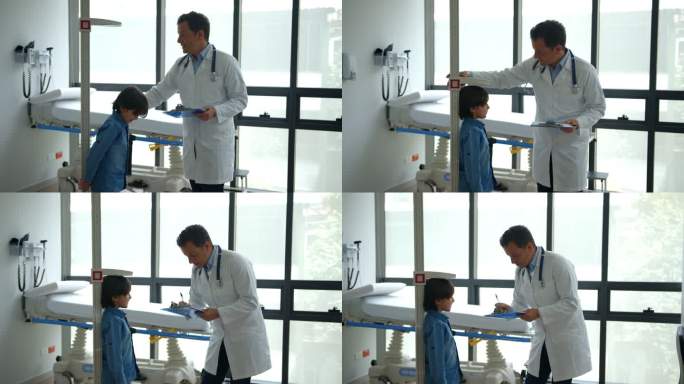 友好的儿科医生一边给他9岁的病人打个招呼，一边给他打个招呼一边微笑
