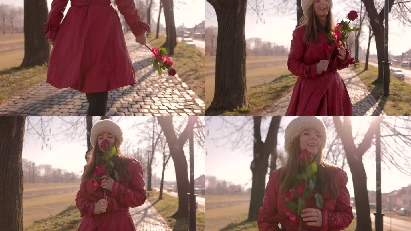 穿着红色外套的女人手里拿着一朵玫瑰