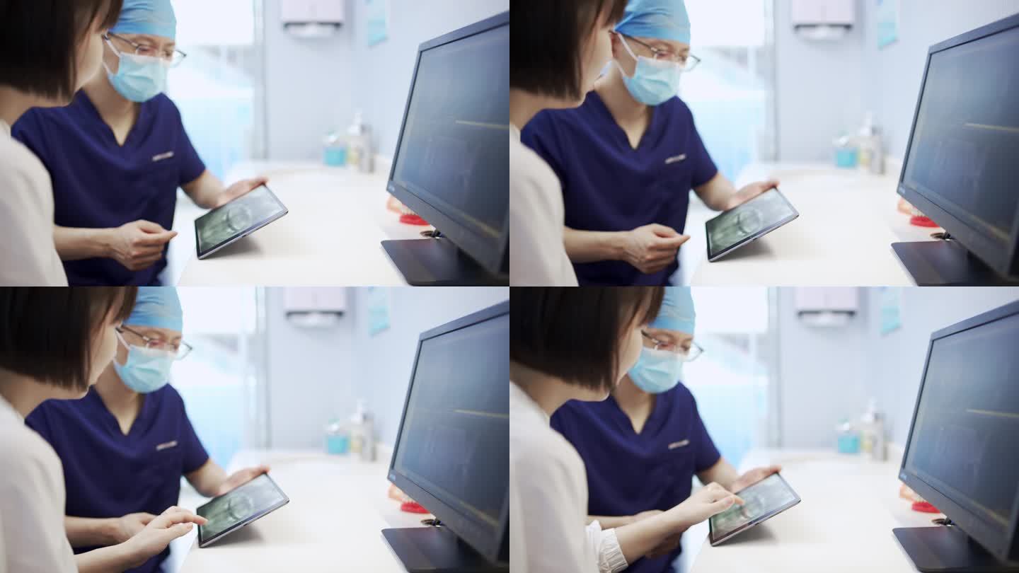 牙医在电脑上看x光片