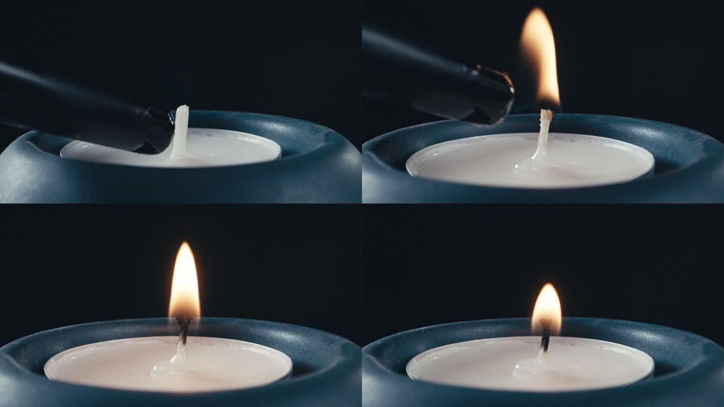 黑暗室内燃烧的蜡烛特写