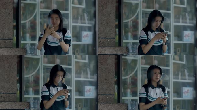 【4K阿莱】高中女生公交站台躲雨玩手机