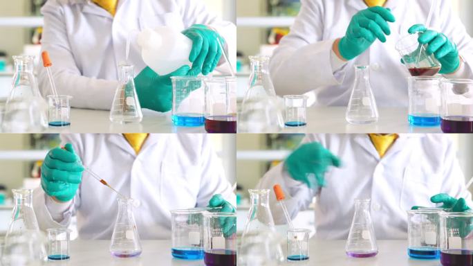 特写：专业化学家的手，穿着防护服，戴着手套，将吸液管中的溶液加入烧瓶中的蓝色混合物中。在现代实验室工