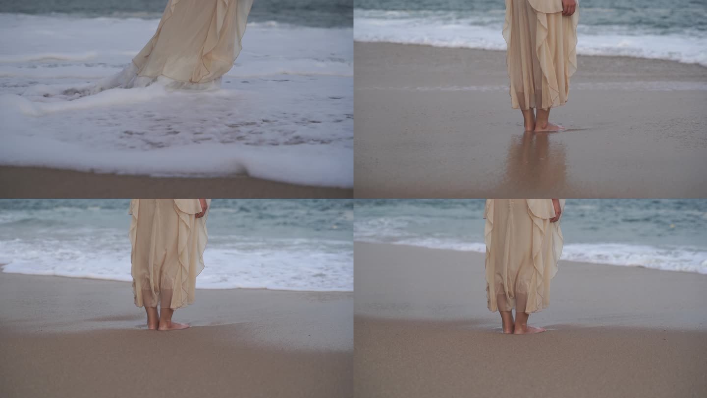 美女站在海边沙滩海水冲刷脚丫裙子海滩浪花