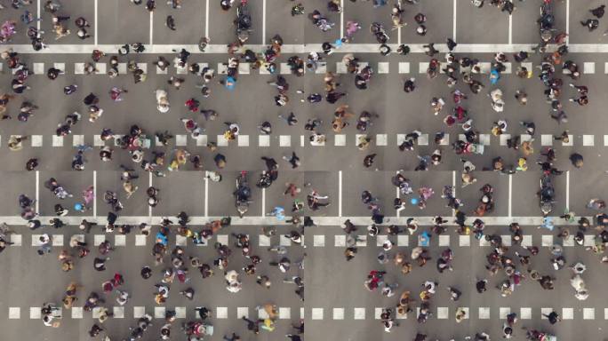 行人在拥挤的交通中穿行的鸟瞰图