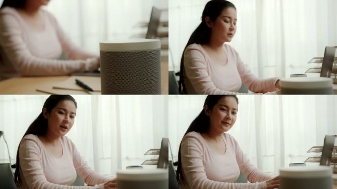 使用Smart Speaker Digital Assistant技术特写女商人。女性语音命令智能扬