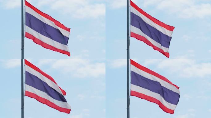 蓝色天空背景的慢动作泰国国旗。