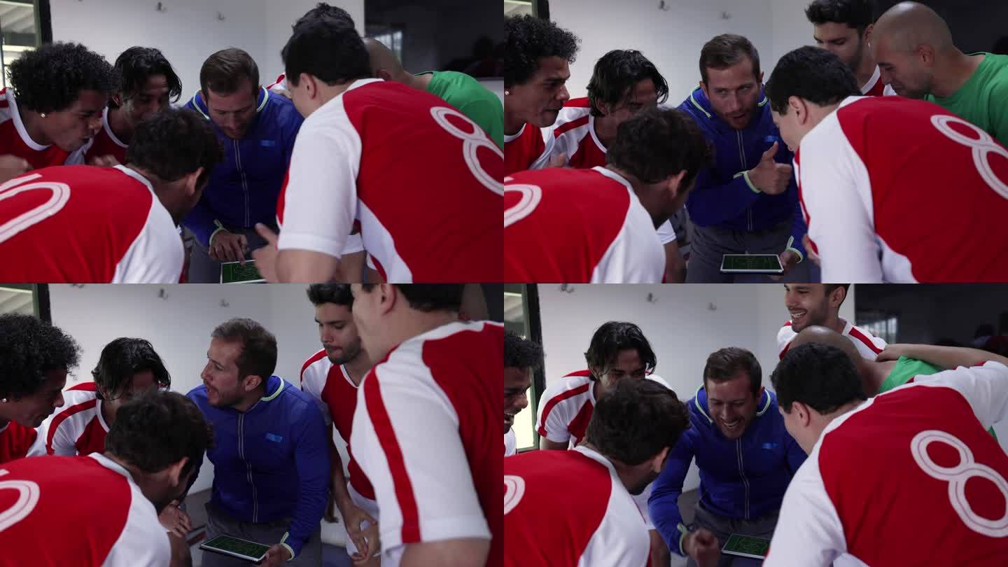 一位拉丁美洲教练一边拿着平板电脑，一边和他的足球队谈论他们的比赛策略