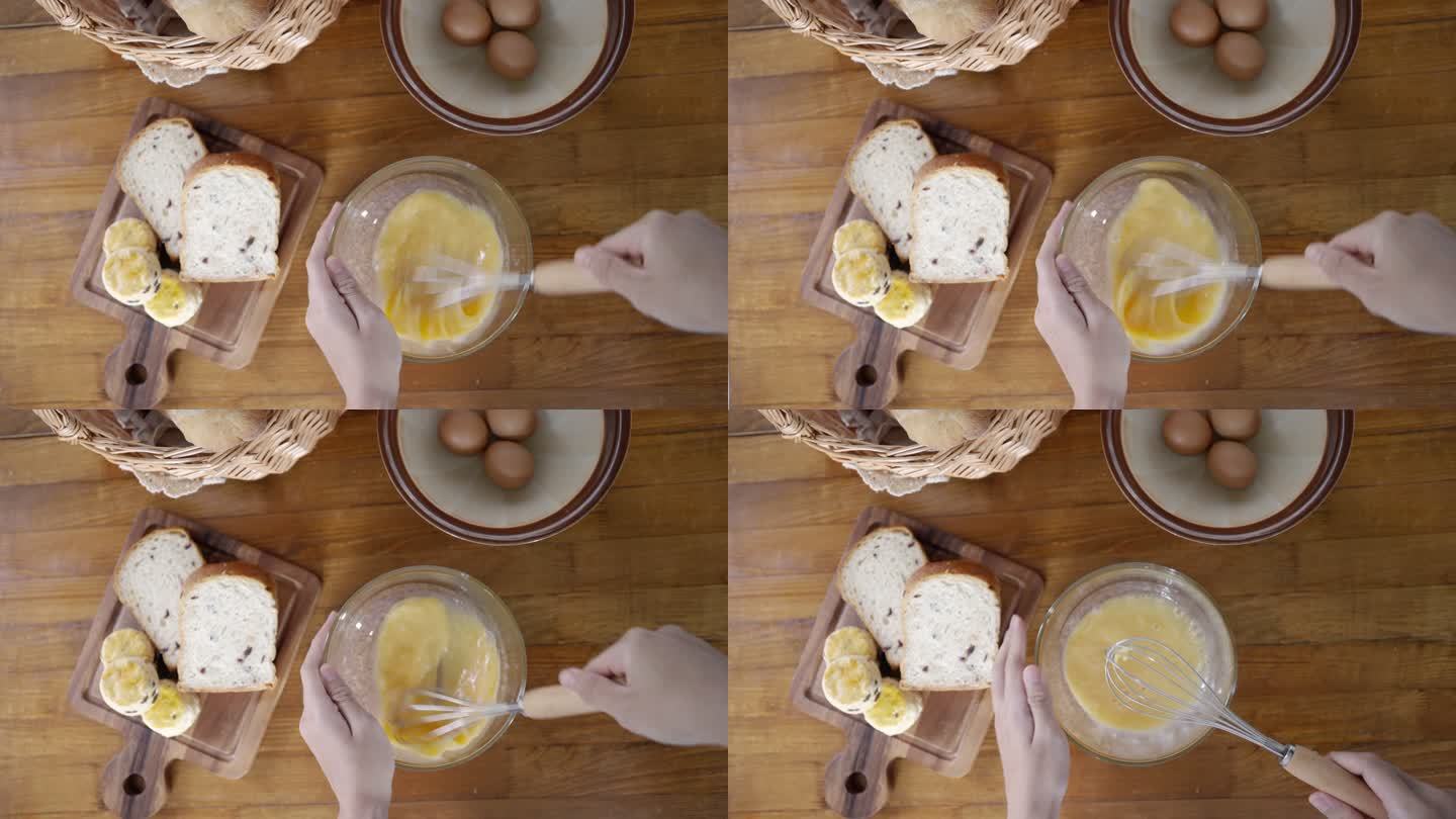 用手打鸡蛋准备食物