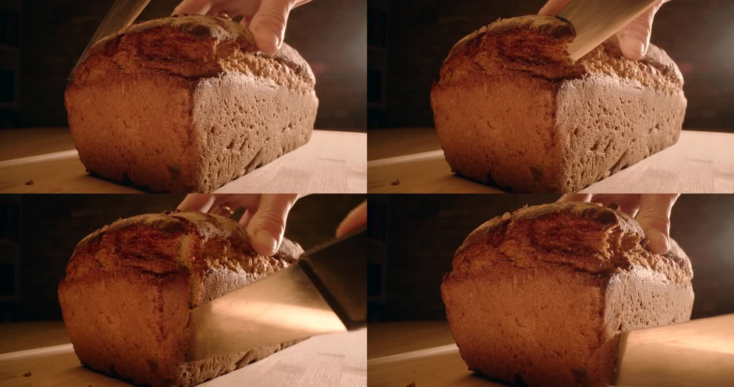 切新鲜自制棕色面包