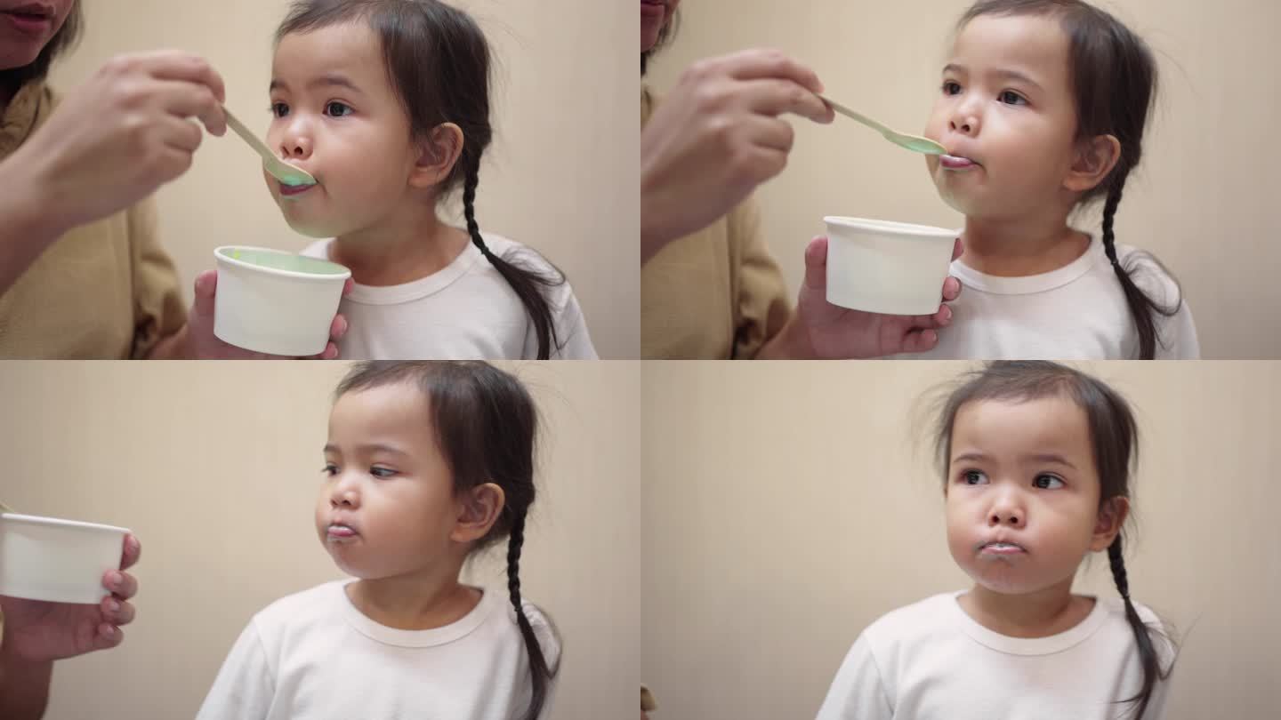 小女孩喜欢吃冰淇淋