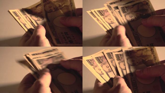 从信封里拿出一张10000日元的钞票，数一数。