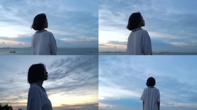 美女孤独站在海边看海夕阳天空唯美短发女孩