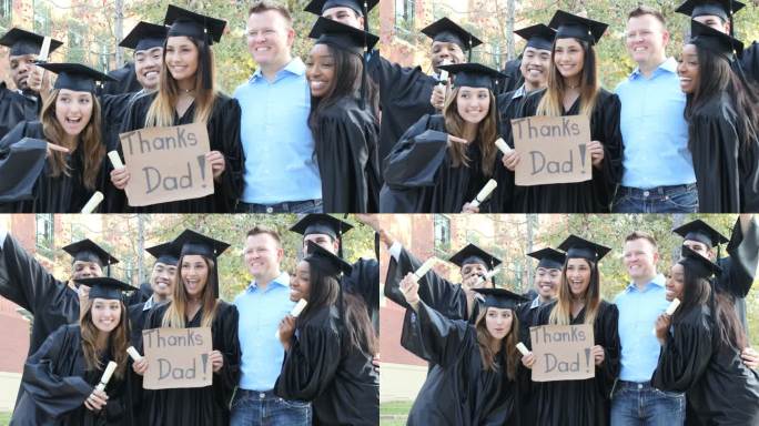 毕业典礼后，大学生们举着“谢谢爸爸”的牌子。