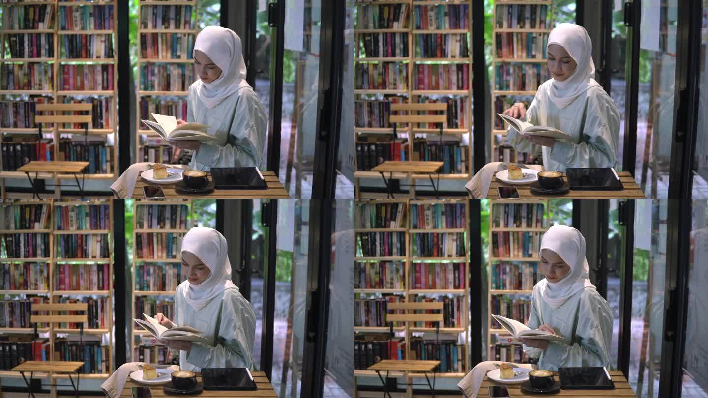 在图书馆咖啡馆看书的女人