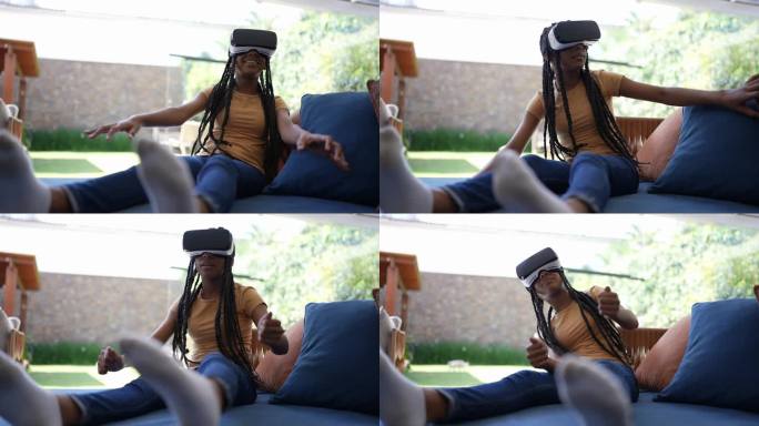 青少年女孩在家玩VR眼镜