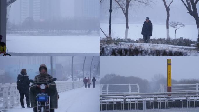 风雪中行走人车流雪中前行雪中漫步大雪纷飞