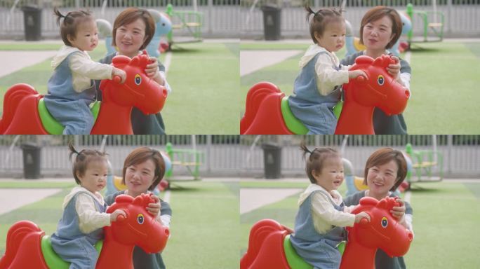 妈妈和女儿玩滑板幼儿园亲子活动母爱