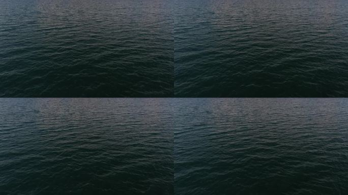 航拍黄昏时分的纳木错湖面