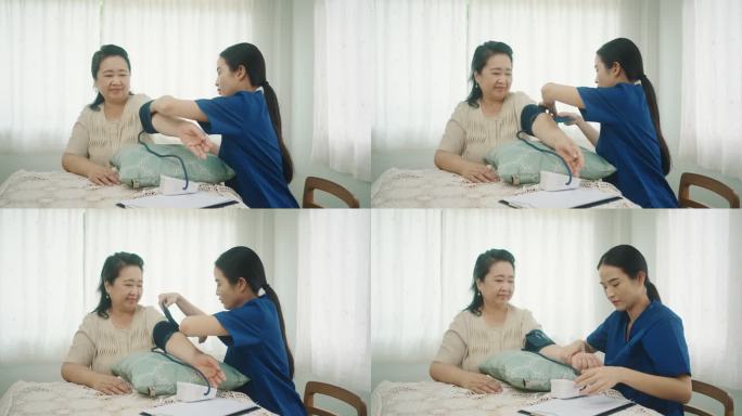 护士在家为老年患者量血压