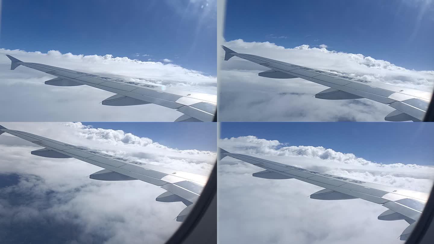 机舱内实拍飞机在云上飞行