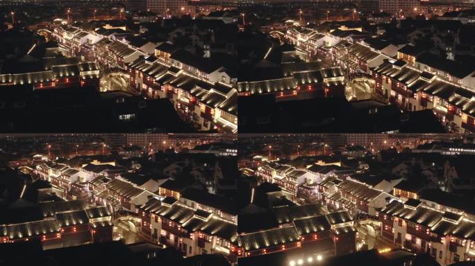 中国苏州运河城夜景。