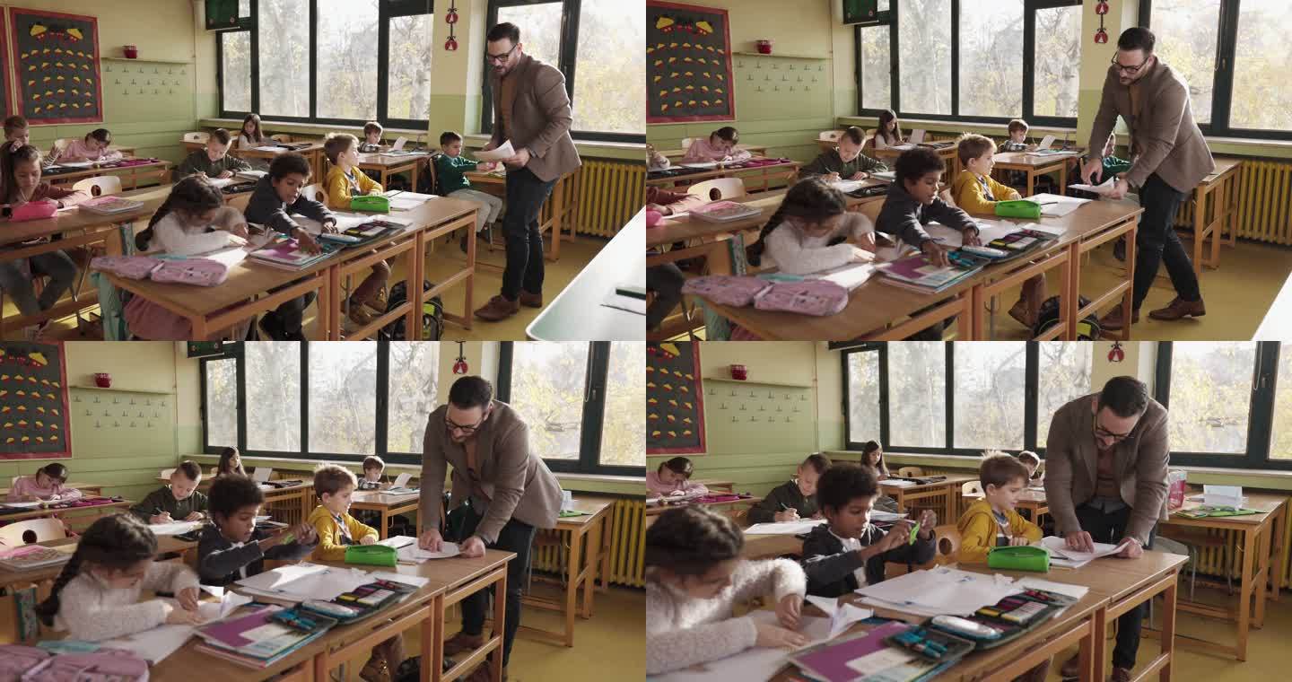 一位年轻的男教师在小学协助一名学生上课。