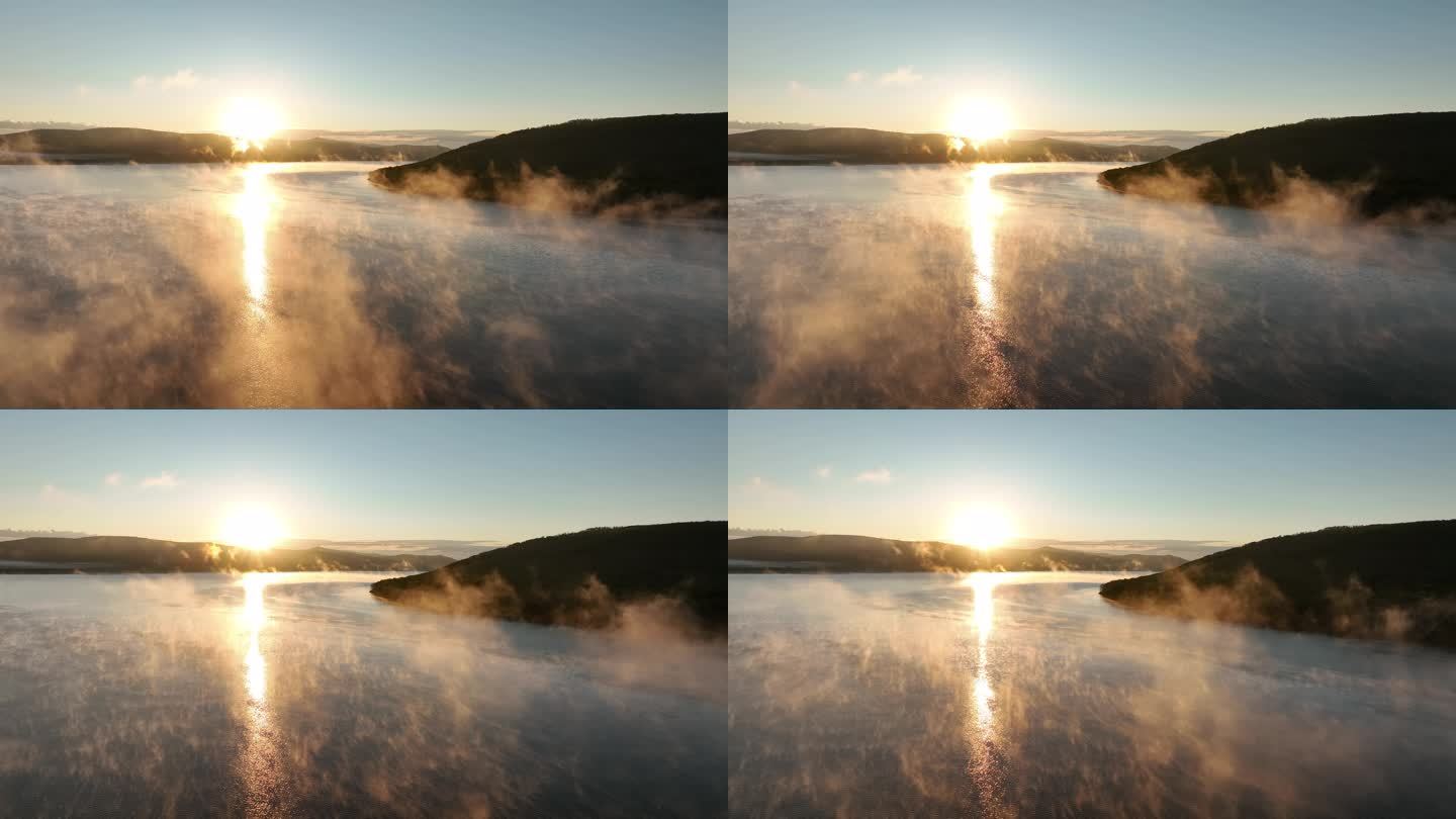 航拍晨雾缭绕的阳光湖泊