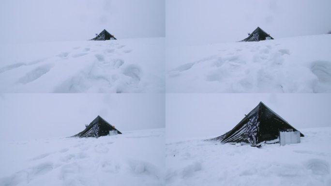 在冬天的山上锄雪和帐篷露营。大自然中的孤独。