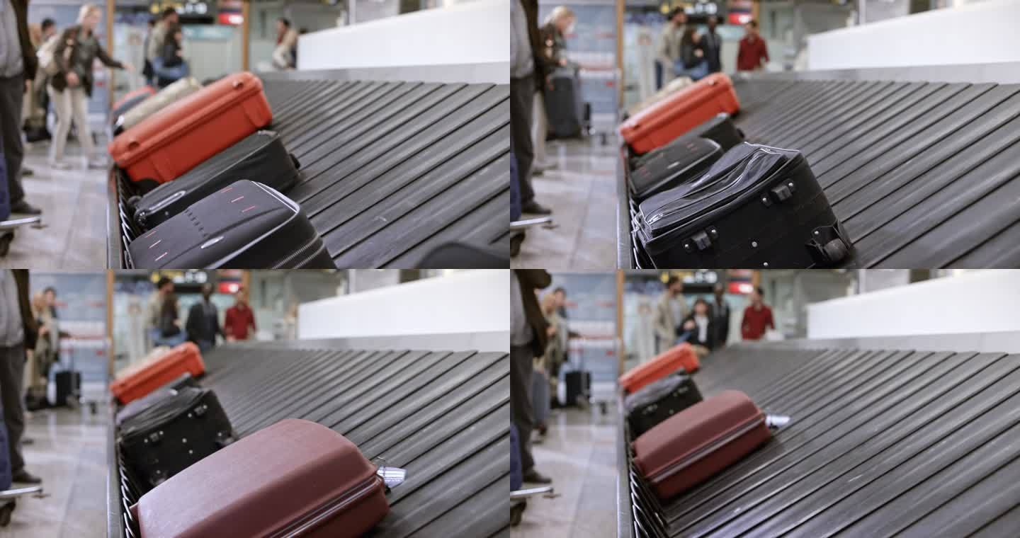 LD在机场行李提取区的行李传送带上移动的旅行行李