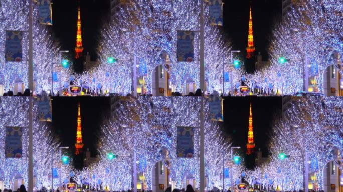 在六本木的Keyakizaka，圣诞灯和人们可以看到东京塔。