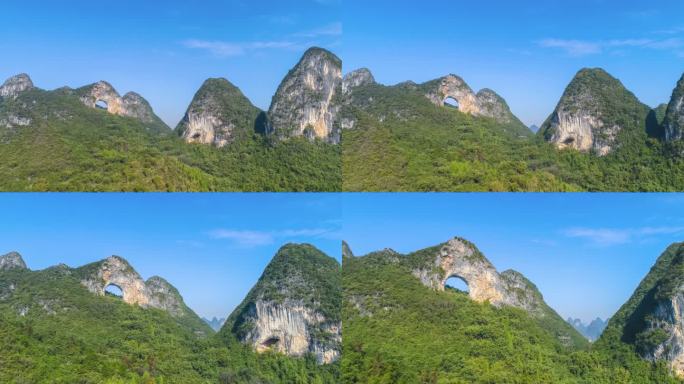 这座奇特的喀斯特山脉叫做月亮山，中间有一个洞