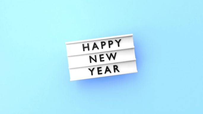 新年快乐文字显示在4K分辨率的蓝色背景灯箱上