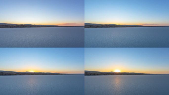 冬天冰封湖面的日出