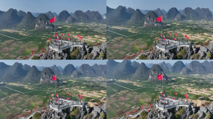 广西桂林会仙玻璃田山脊上的国旗
