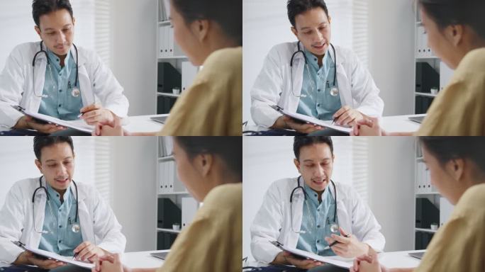 成熟的亚洲男性医生在健康诊所与女性患者会诊时的医疗结果。