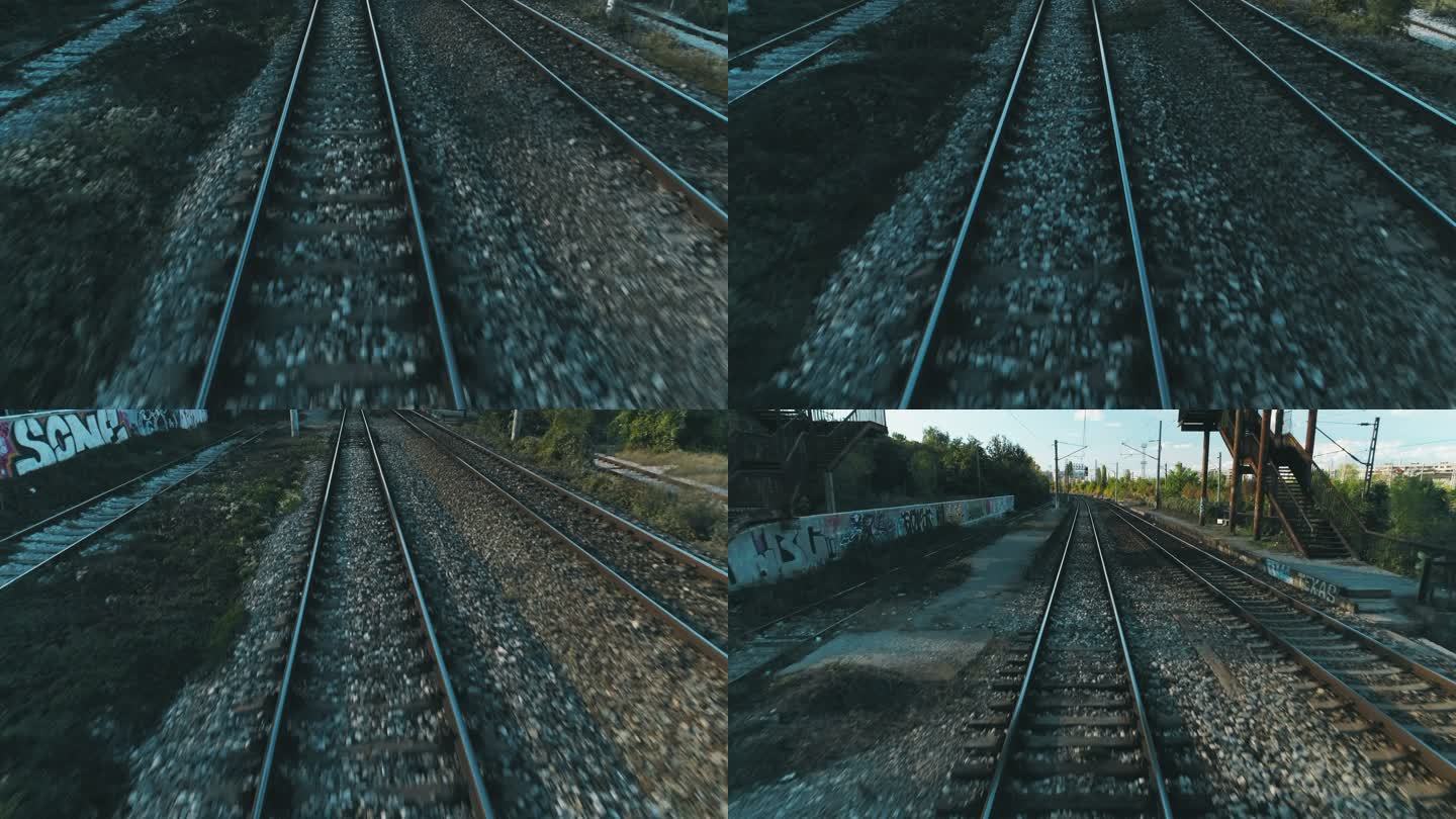 一架视频无人机在铁路轨道上空低空飞行的动作镜头