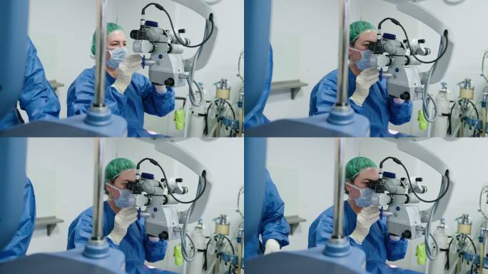女医生用显微镜做眼科手术